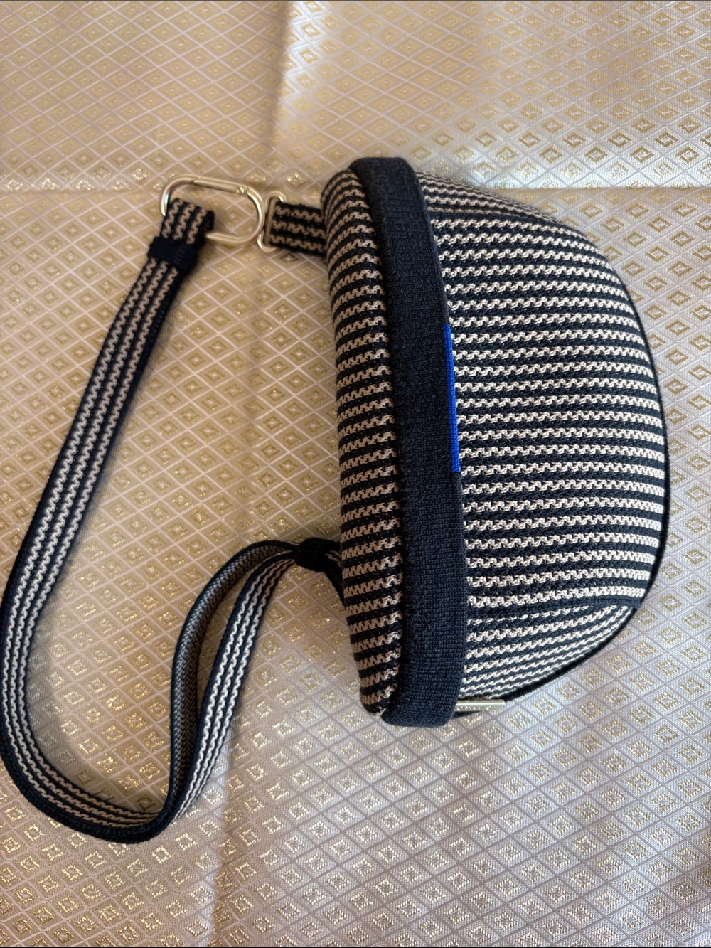 Rothy's Striped Wristlet, The Casual Sling in a striped pattern 9” x5”